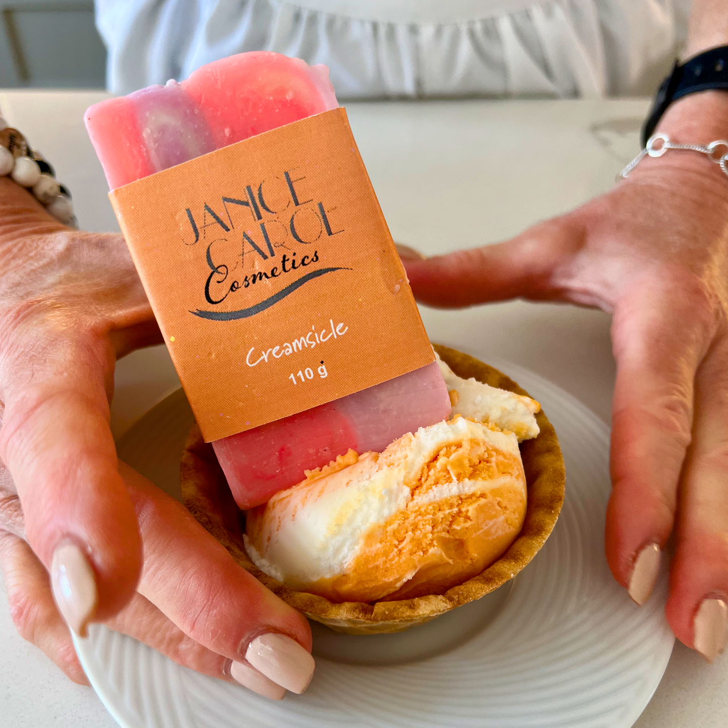 Creamsicle: Orange tangerine swirls with a touch of strawberry